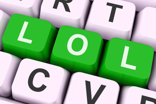Lol written on a keyboard inside an article on how to gain business on social media