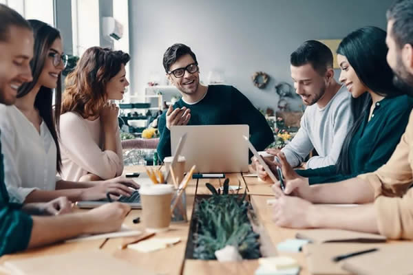 A group of people discussing their digital marketing careers