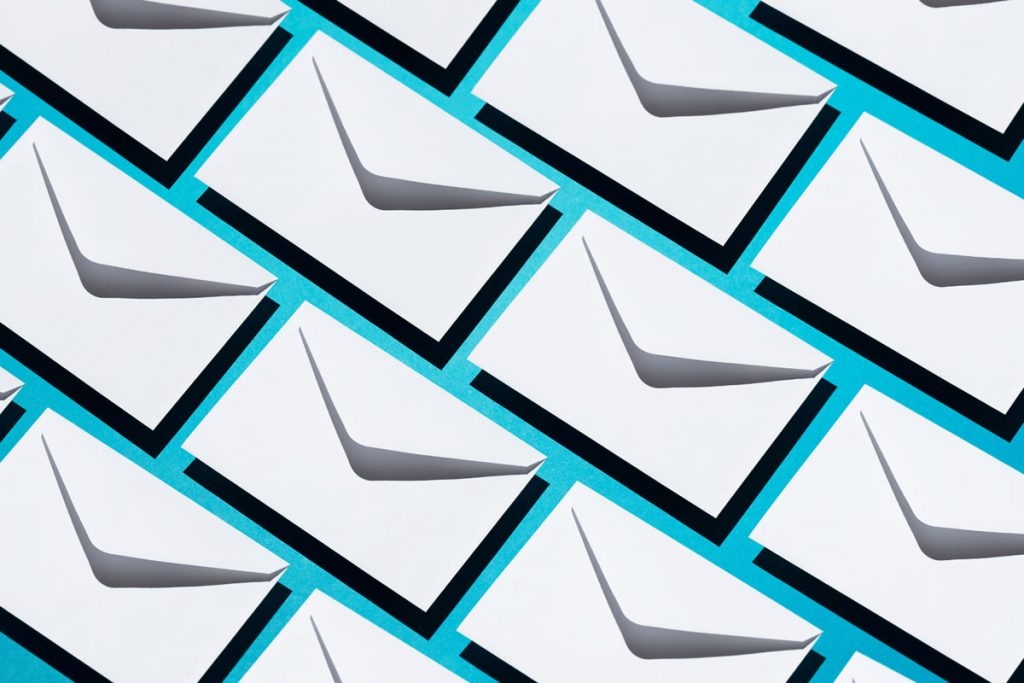 Rows of open envelopes neatly organized