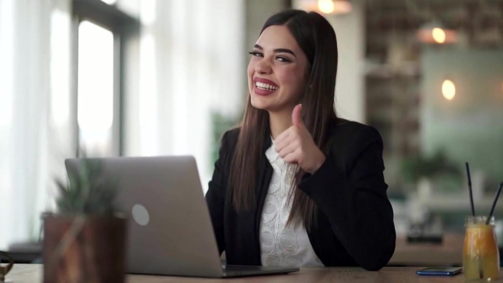 Woman giving a thumbs up. Benefits of a Single Agency Testimonials